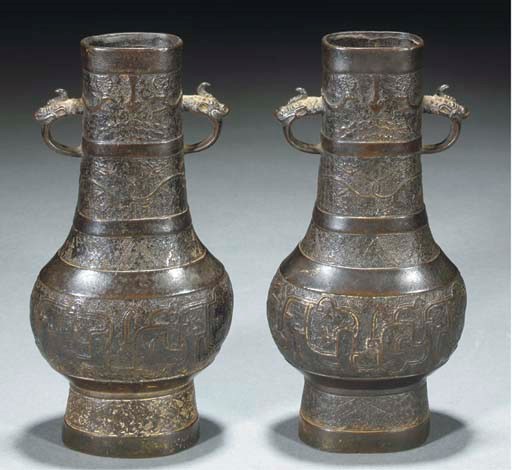 A pair of bronze flattened pear-shaped vases, Song/Jin Dynasty