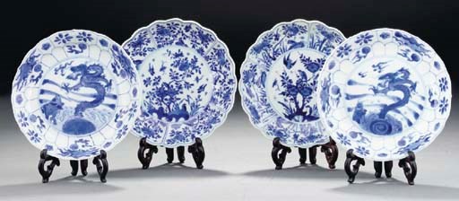Two pairs of blue and white moulded saucer dishes, Kangxi