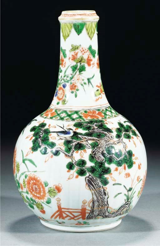A famille verte moulded bottle vase, Kangxi