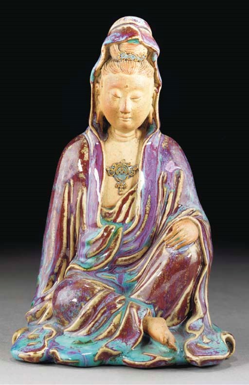 A flambe glazed buscuit model of Guanyin, 18th century