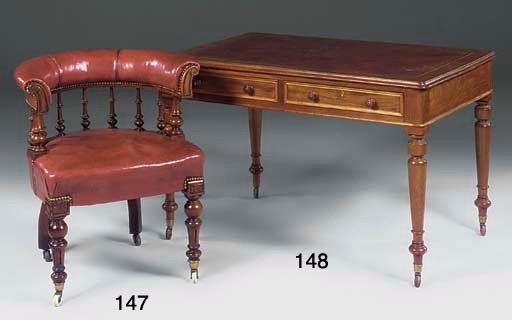 A late Victorian mahogany library armchair