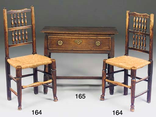 A matched set of eight ash Cheshire/Lancashire spindle back dining chairs