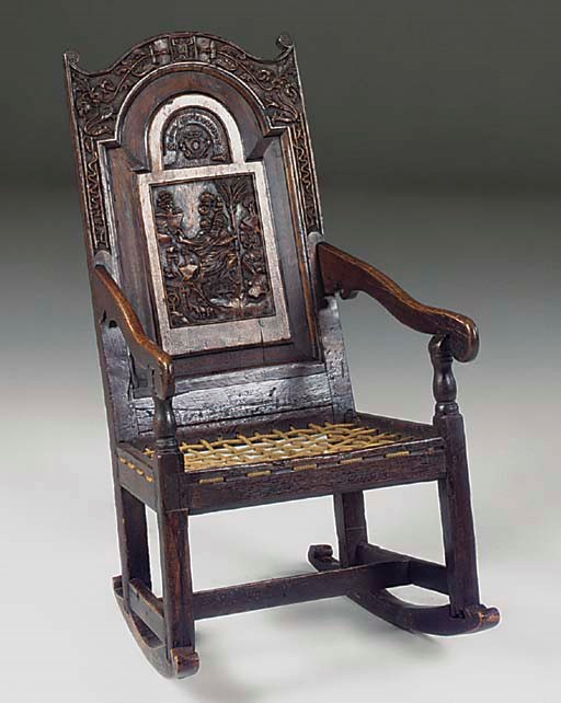 AN OAK ROCKING CHAIR