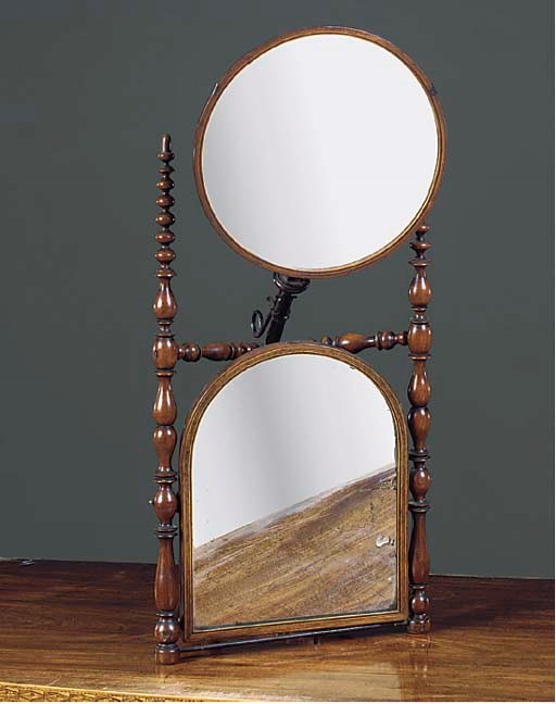 A VICTORIAN WALNUT ADJUSTABLE WIG MIRROR