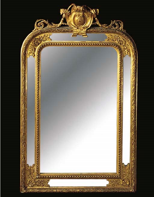 A FRENCH GILT COMPOSITION OVERMANTEL MIRROR