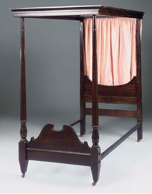 AN EDWARDIAN MAHOGANY FOUR POST SINGLE BED
