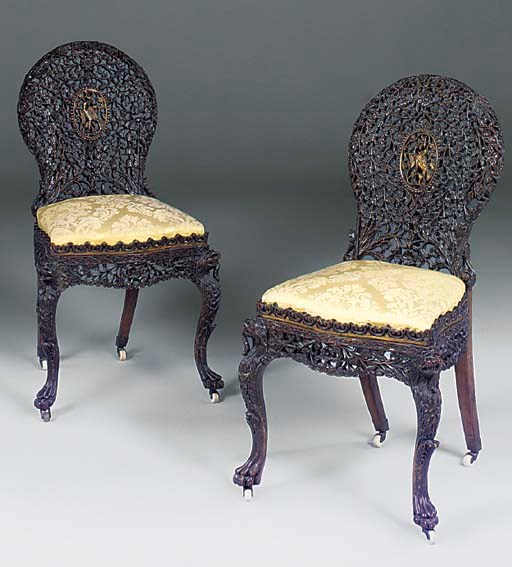 A PAIR OF CHINESE CARVED HARDWOOD SIDE CHAIRS