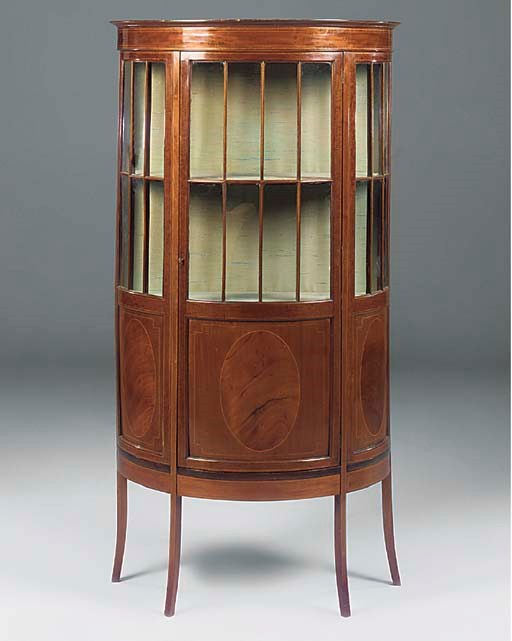 AN EDWARDIAN MAHOGANY AND INLAID DEMI-LUNE DISPLAY CABINET