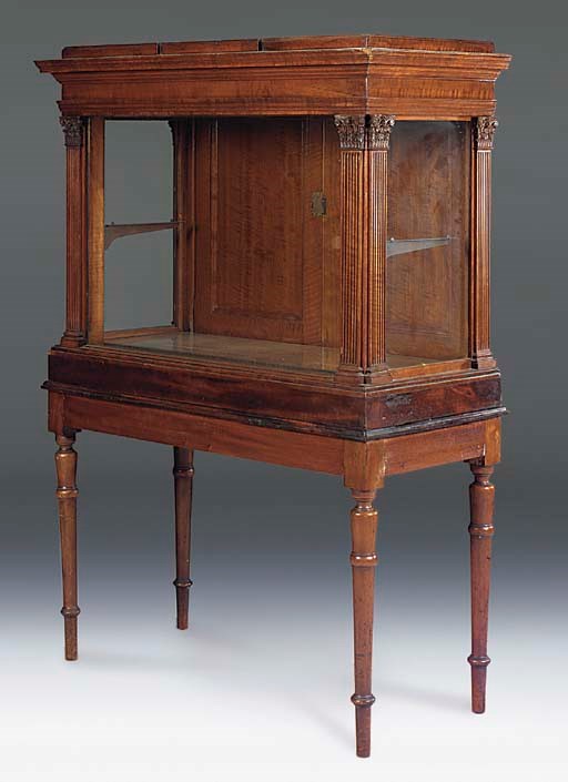A PAIR OF EDWARDIAN MAHOGANY ARCHITECTURAL DISPLAY CABINETS ON STAND