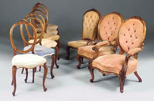 A VICTORIAN WALNUT DRAWING ROOM SUITE
