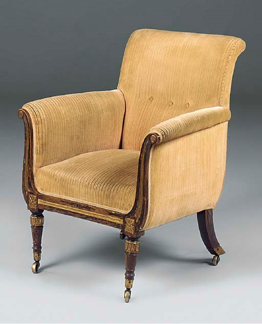 A SIMULATED ROSEWOOD AND GILT LIBRARY ARMCHAIR