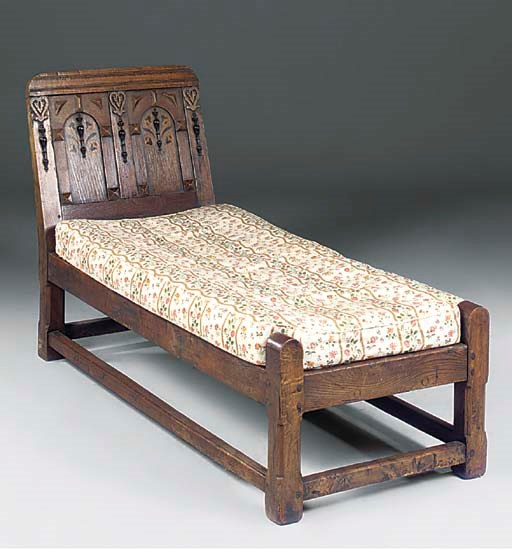 A VICTORIAN OAK AND INLAID DAYBED