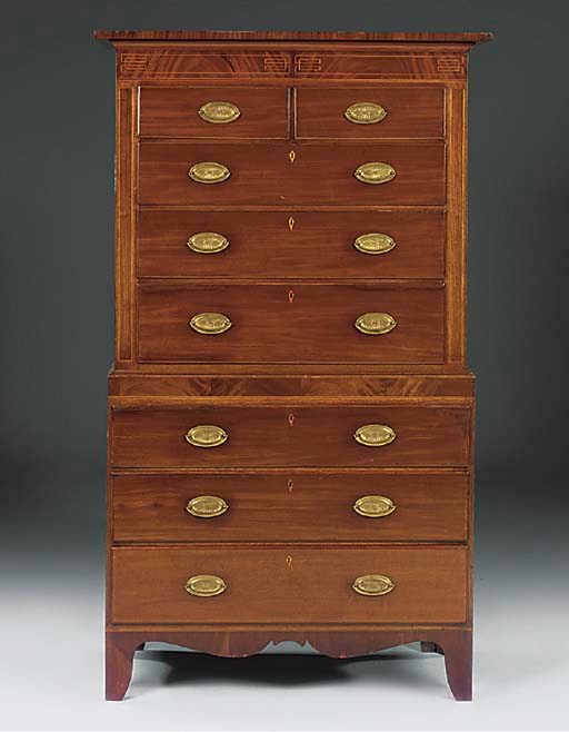 A George III mahogany and rosewood inlaid chest on chest