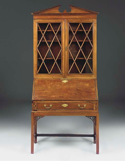 A mahogany bureau bookcase