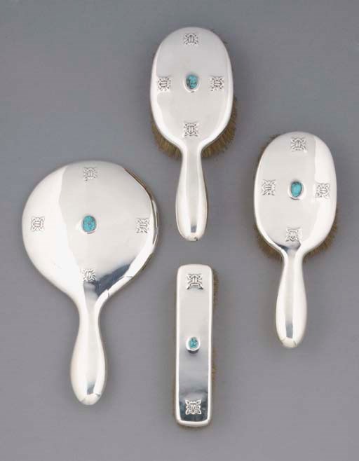 A Liberty and Co. Silver and Turquoise Dressing Table Set
