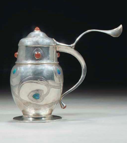 A Liberty and Co. Silver, Enamel and Carnelian Tankard