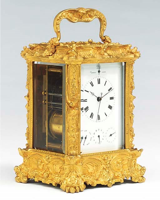 A French gilt-brass grande sonnerie carriage clock with chronometer escapement, sweep seconds, calendar and alarm, mid 19th century