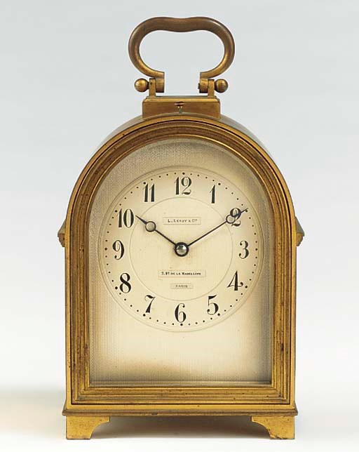 A French gilt-brass striking and repeating carriage clock with alarm, early 20th century