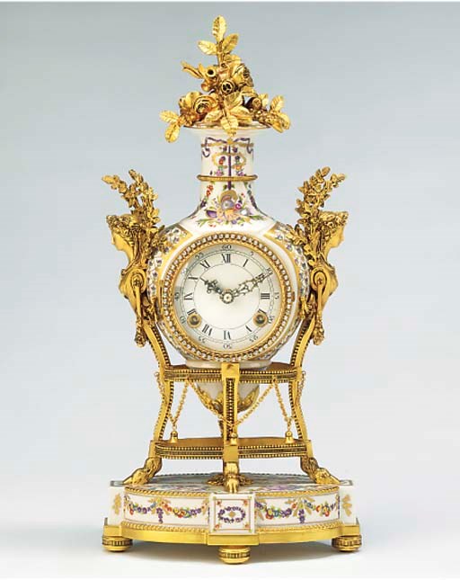 A porcelain and gilt-metal mounted striking mantel clock, modern