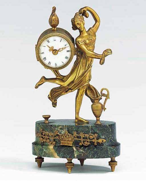 A French bronze and marmo verde antico figural mantel timepiece, late 19th century