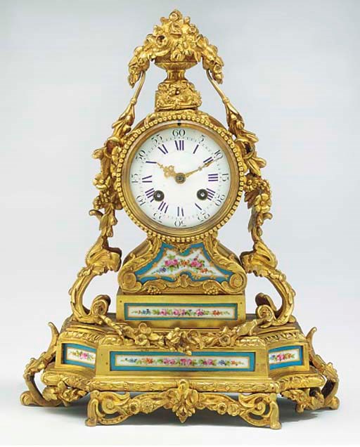 A Napoleon III bronze and porcelain-mounted striking mantel clock, third quarter 19th century