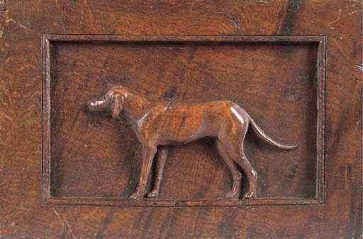 A WELSH RELIEF CARVED OAK PANEL