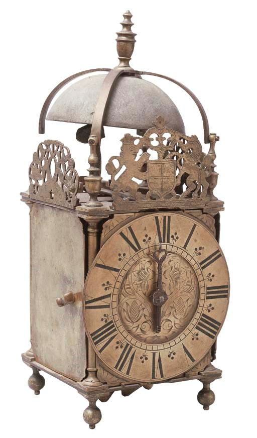 A GEORGE I BRASS LANTERN CLOCK