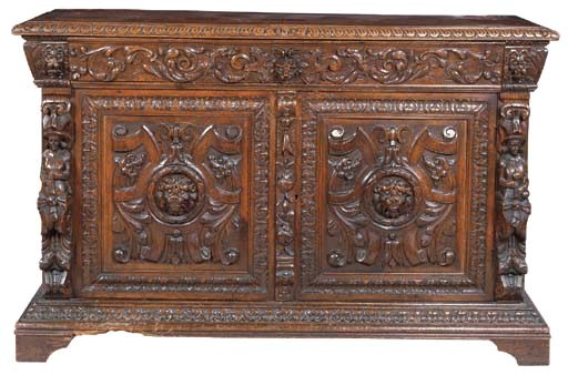 AN EARLY VICTORIAN OAK SIDE CABINET