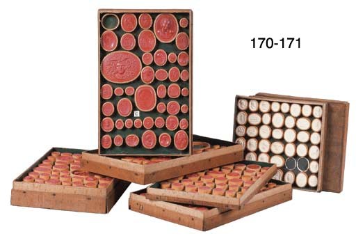 A REGENCY BEECH CASE WITH FORTY-ONE PLASTER INTAGLIOS