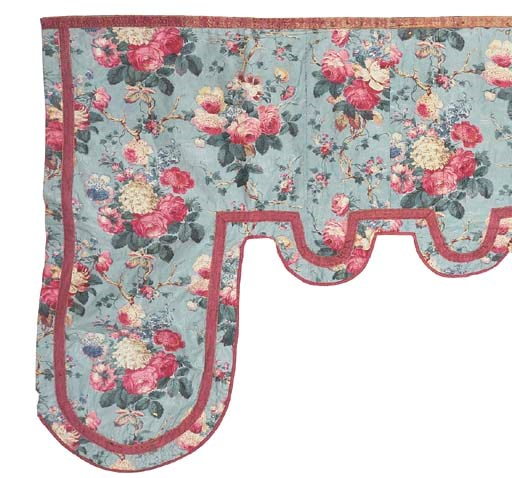 A GLAZED CHINTZ SHAPED PELMET