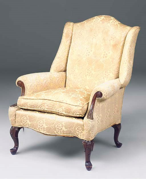 A MAHOGANY EASY ARMCHAIR
