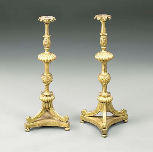 A PAIR OF ITALIAN GILTWOOD PRICKET CANDLESTICKS
