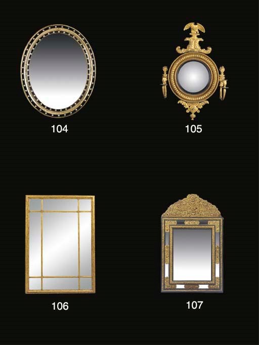 A SMALL REGENCY GILTWOOD GIRANDOLE CONVEX MIRROR