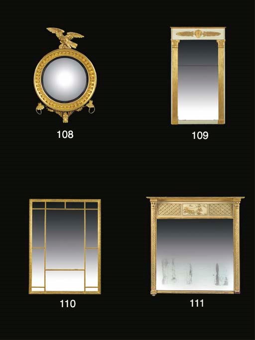 A REGENCY GILTWOOD GIRANDOLE CONVEX MIRROR