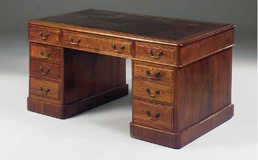A LATE VICTORIAN MAHOGANY PEDESTAL DESK