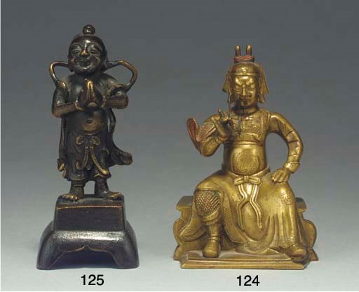 A small Chinese bronze model of Guandi, 17/18th Century