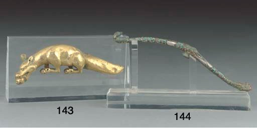 A Tibetan gilt copper model of a mongoose, 18th century