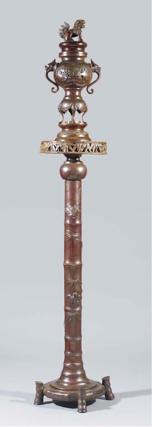 A Japanese bronze koro, cover and associated sectional stand, 19th century