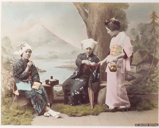 A Japanese sepia and hand coloured photograph album, 20th century