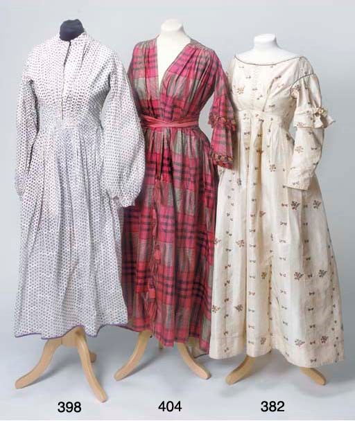 A dress of ivory silk brocade, woven with scattered floral sprigs against a striped ground, the lined bodice trimmed with blue silk piping and embroidered with lacing detail to the front, the neckline with machine lace trim, the long shaped sleeves with a double self-fabric ruffle at the elbow, the full skirt with pleats falling from a high waistband, circa 1840, made from 18th century silkSee Illustration