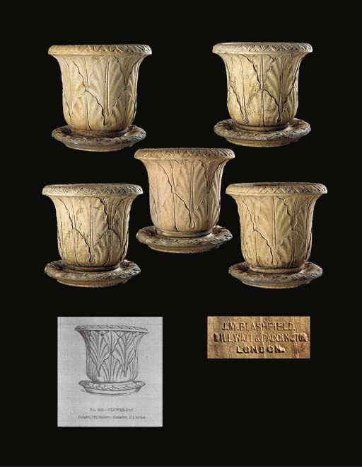 A GROUP OF FIVE ENGLISH TERRACOTTA PLANTERS