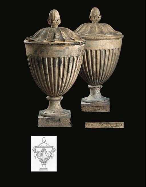 A PAIR OF ENGLISH COADE STONE FINIALS