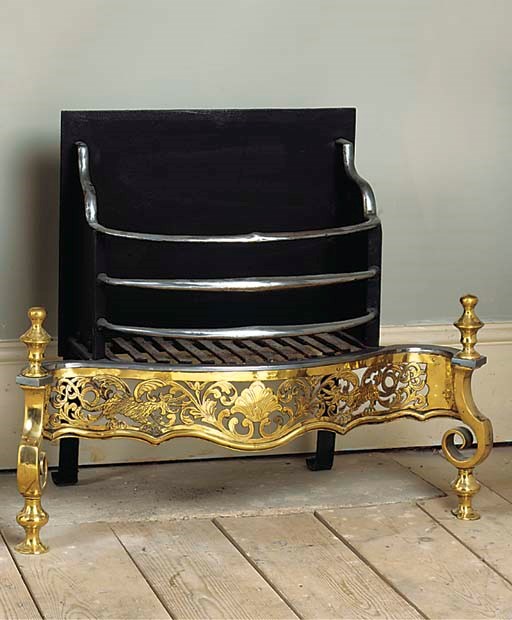 AN ENGLISH BRASS AND STEEL FIREGRATE