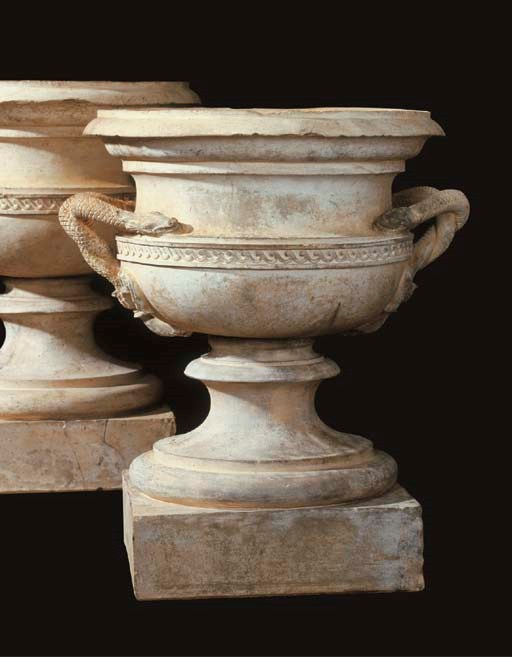 A pair of English terracotta urns