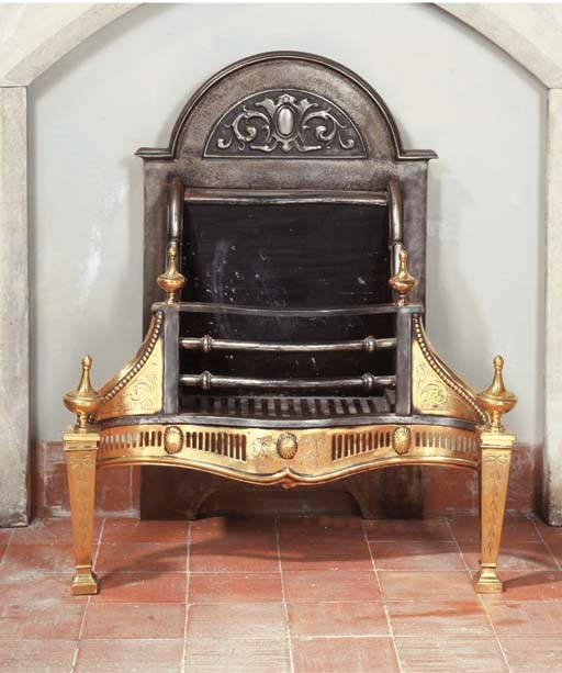 AN ENGLISH CAST IRON AND BRASS FIREGRATE