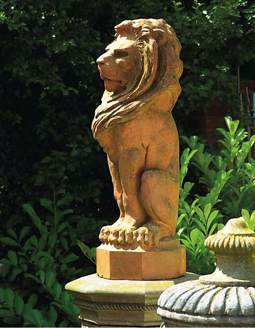 A LARGE ENGLISH TERRACOTTA MODEL OF A LION