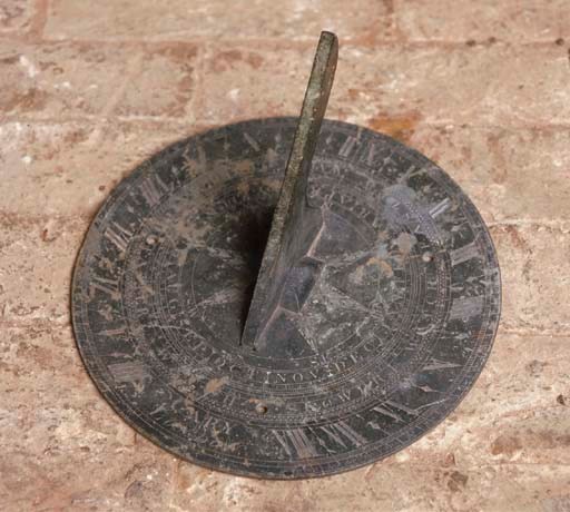 AN ENGLISH BRONZE SUNDIAL PLATE