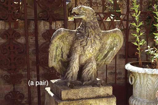 A PAIR OF ENGLISH ARTIFICIAL STONE EAGLE PIER FINIALS