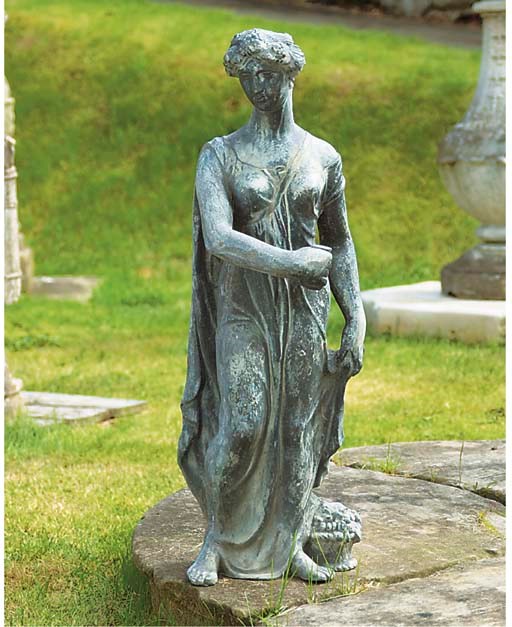 A LEAD FIGURE OF A LADY