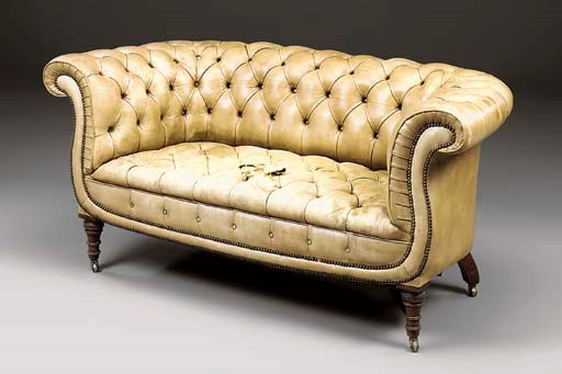 A SMALL MAHOGANY CHESTERFIELD SOFA